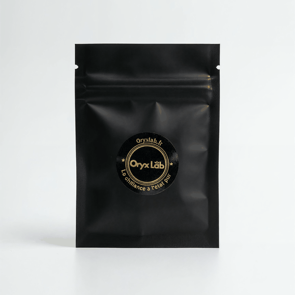 Emballage noir élégant du Gold Seal Hash CBC, résine de cannabichromène de haute qualité.